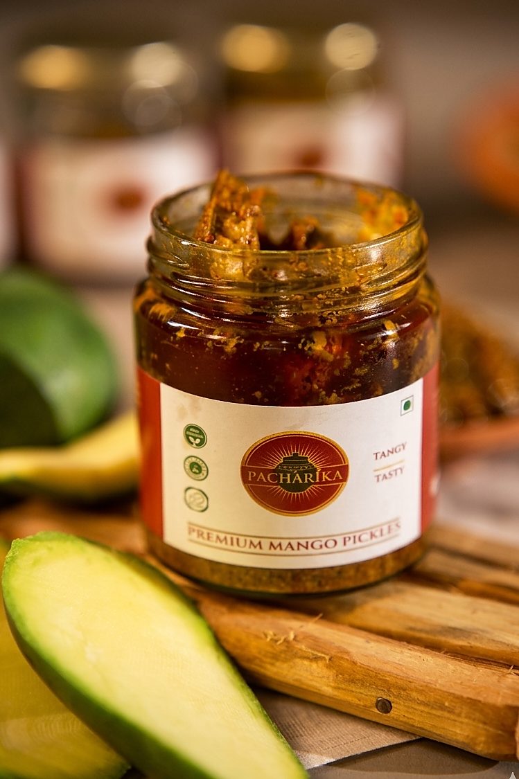 Open jar showing premium mango pickle inside