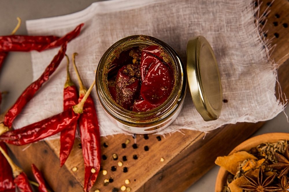 Open mango pickle jar top view